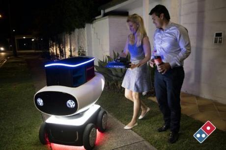 Domino's new trial pizza delivery robot in New Zealand is just under a meter (three foot) high and contains a heated compartment that can hold up to 10 pizzas. (AFP Photo/)