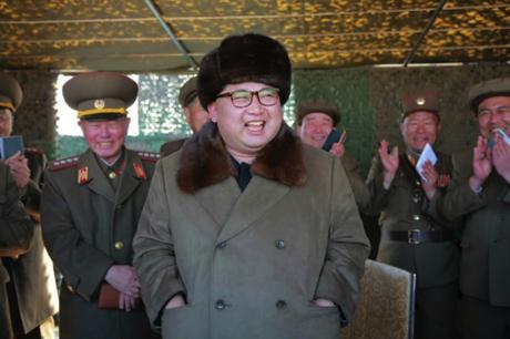 Kim Jong Un observs the test firing of a new 300 mm multiple launch rocket system (Photo: Rodong Sinmun).