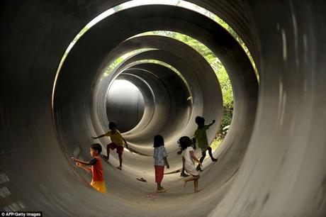 poor of Manila, Phillipines live in make shift homes inside concrete pipes ... and Madras  !!