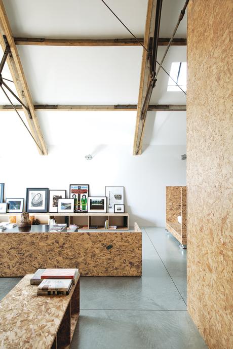 Modern living room area covered in OSB walls 