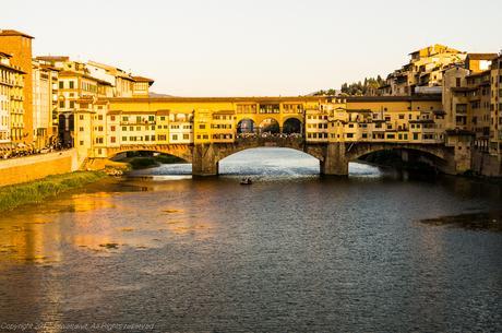 Ponte Vecchio over the Arno as the sun is setting