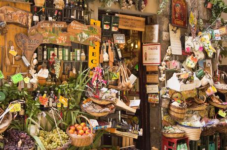 Flowers and fruits for sale at a market in Florence