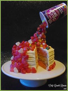 3 layered raspberry & white chocolate cake presented as an illusion cake with jelly beans