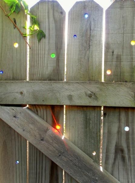 Glass Marbles Used To Make Colourful Fence