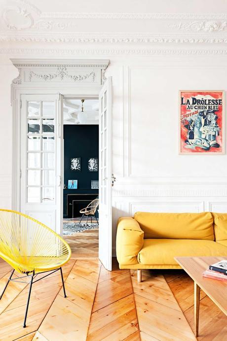 A French apartment with amazing classical bones mixed with modern furniture