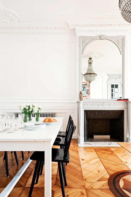 A French apartment with amazing classical bones mixed with modern furniture
