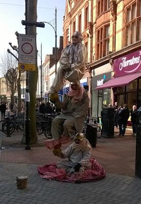 Cats and Street Performers