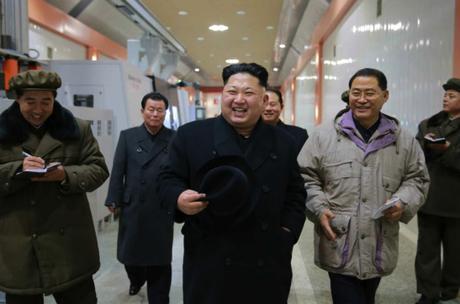 Kim Jong Un visits the January 18 General Machinery Plant in South P'yo'ngan Province. At the right is Pak T'ae Song (Photo: KCNA).
