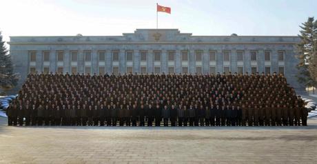 Kim Jong Un poses for a commemorative photo with personnel involved in the January 2016 nuclear test in front of the WPK Central Committee Office Building #1 (Photo: Rodong Sinmun).