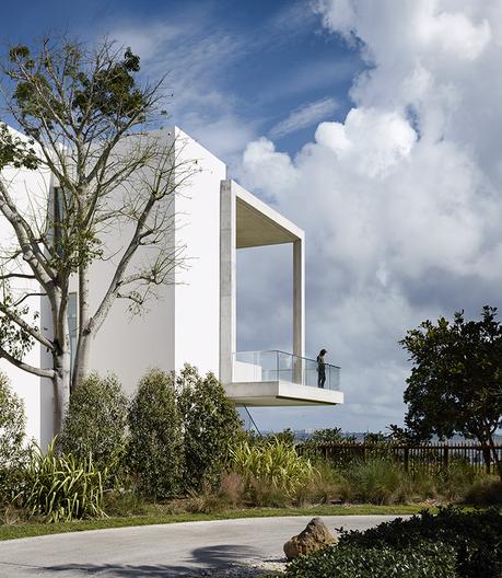 Casa Bahia by Alejandro Landes features a cantilevered balcony overlooking Biscayne Bay in Miami, Florida