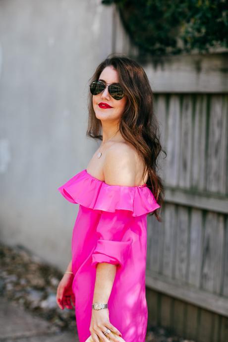 Dallas Blogger Amy Havins wears an Amanda Uprichard off the shoulder pink mini dress.
