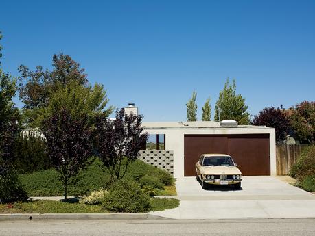 Streetside, foliage and a concrete wall by artist Evan Holloway camouflages Anthony Pearson and Ramona Trent’s low-key Mar Vista home.