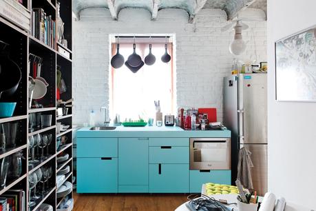 modern kitchen renovation with blue countertops 