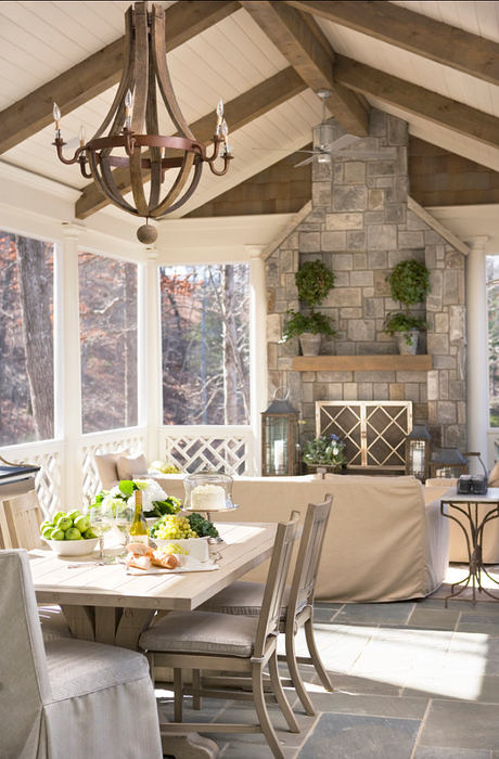 outdoor porch with stone fireplace