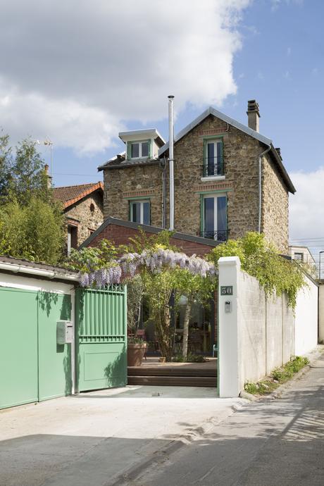 The driveway leads up to a renovated home in France