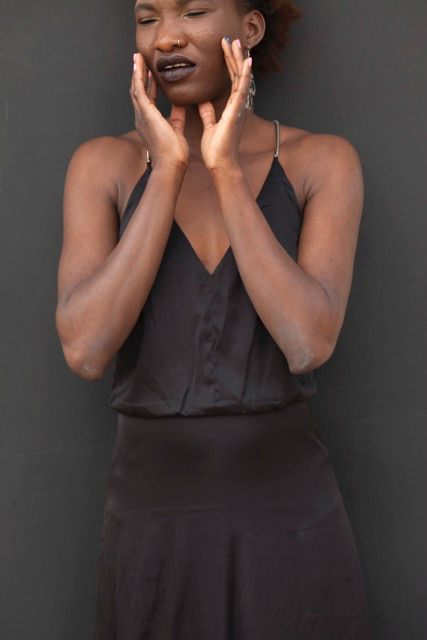 Black silk dress on a black woman