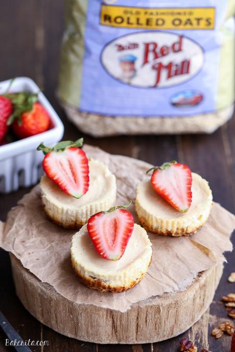 These Greek Yogurt Cheesecakes are smooth and creamy with a bit of tanginess and a crunchy granola crust. These gluten-free cheesecakes were delicious for breakfast topped with fresh berries, and they're only 177 calories each!