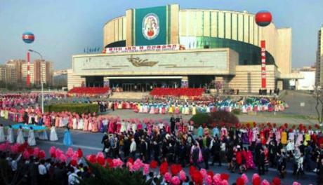 DPRK performing artists and participants at the 30th Spring Friendship Arts Festival, held in conjunction with celebrations for late DPRK President and founder Kim Il-so'ng, gather outside the East Pyongyang Grand Theater on March 11, 2016 (Photo: Rodong Sinmun).