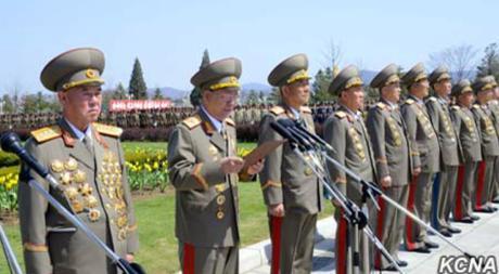KPA General Political Department Director Vice Marshal Hwang Pyong So (2nd left) delivers a speech at a meeting of KPA service members and officers to mark Kim Il Sung's birth anniversary. Also in attendance is Chief of the KPA General Staff Ri Myong Su (left) (Photo: KCNA).
