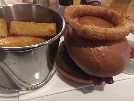 Order a burger and giant onion ring at stove restaurant, part of The Langdale Hotel and Spa