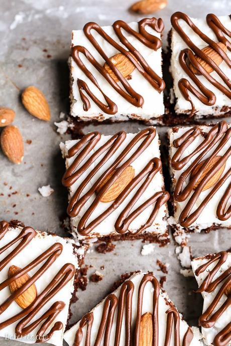 These Almond Joy Brownies have a coconut butter topping and a drizzle of dark chocolate - you'd never guess that these indulgent brownies are gluten-free, refined sugar-free, and Paleo!