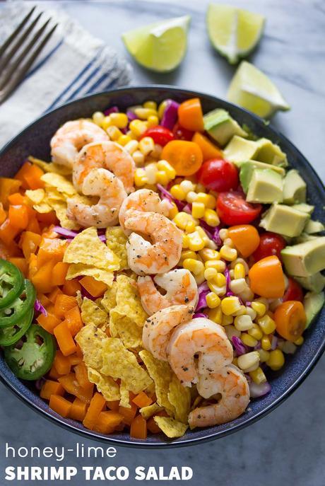 Honey Lime Shrimp and Avocado Taco Salad, a healthier dinner recipe that is ready in under 20 minutes!