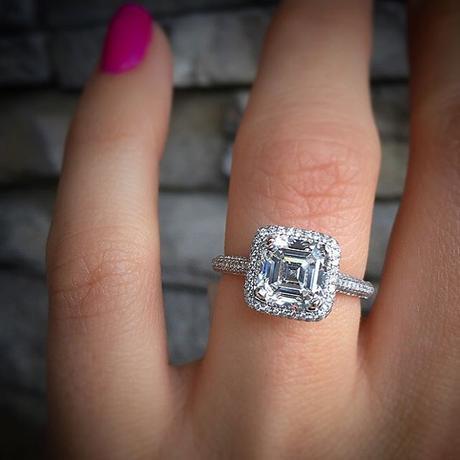 This Asscher cut halo engagement ring takes about a month from consultation to delivery, as do most custom rings.