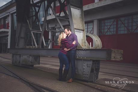 Wedding Photography Bristol - Dramatic Pose with teh bride and groom in front of a crane at MShed in Bristols Docks