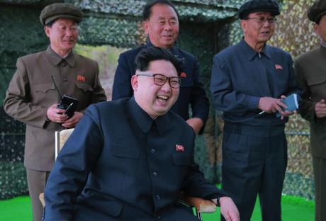 Kim Jong Un observes the test firing of a submarine-launched ballistic missile.  Also in attendance, behind him, are Ri Pyong Chol (center) and Ri Man Gon (right) (Photo: Rodong Sinmun).