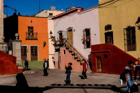 I really like this shot, there is so much going on, all these people doing strange things. And that is exactly what these buildings at Plaza de San Fernando looks like, it is like Fujichrome Velvia was applied to the whole city!