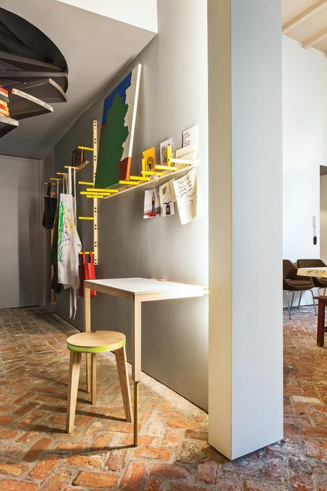 Art nook with wooden side table and stool