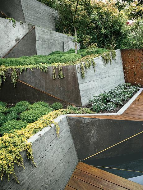 modern landscaping terrace concrete wall ramps ipe deck