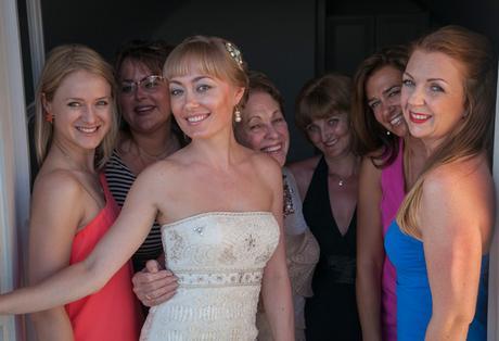 Bride with her bridesmaids|  Bride in a strapless, ivory, frilled wedding dress by Sue Wong| Dasha and Steve's Real Wedding In Greece | Marryme in Greece | Confetti.co.uk