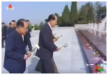 Senior Deputy Director of the WPK Organization Guidance Department Jo Yon Jun and SPA Presidium President Kim Yong Nam place flowers in front of the memorial bust of Kim Jong Suk, mother of late DPRK leader Kim Jong Il and Kim Kyong Hui and grandmother of Kim Jong Un, at the Revolutionary Martyrs' Cemetery in Pyongyang on April 25, 2016 (Photo: KCTV).