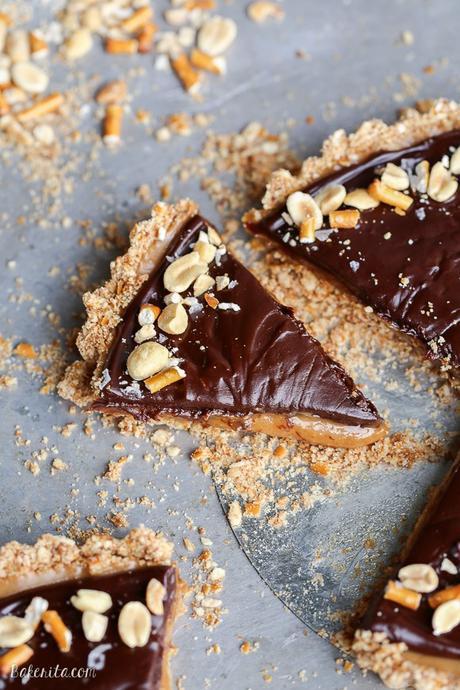 This Chocolate Peanut Butter Tart has a crunchy pretzel crust and smooth peanut butter caramel filling, all topped with luscious chocolate ganache. This recipe is gluten-free and vegan.