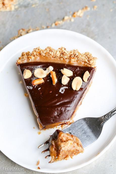 This Chocolate Peanut Butter Tart has a crunchy pretzel crust and smooth peanut butter caramel filling, all topped with luscious chocolate ganache. This recipe is gluten-free and vegan.