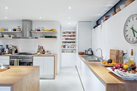 Modern kitchen with oak cabinets and countertop