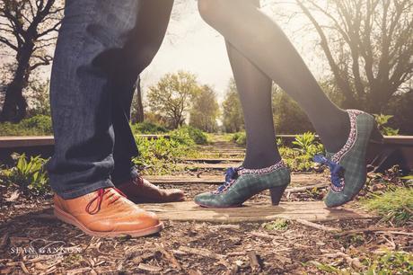 Funky shoes on a railway track 