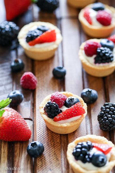 These Mini Berry Tarts have a shortbread crust with coconut cream filling and fresh berries! These sweet dessert bites are Paleo, gluten-free, and vegan.