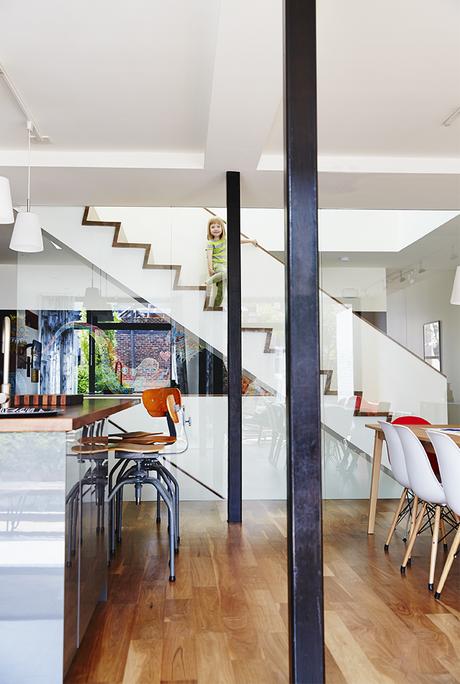 Renovation Montreal family kitchen Singer sewing stools walnut island Ikea lamps