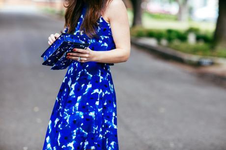 Dallas Blogger, Amy Havins, wears a blue floral print Ivanka trump a-line dress.