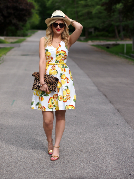 My favorite fashion blogger, Suburban Faux Pas, in a gorgeous dress topped off with a hat. Photo credit: Instagram|Suburban Faux Pas