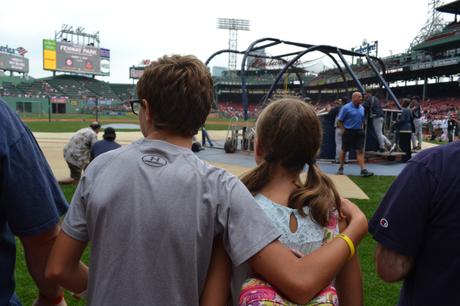 Captured this moment at Fenway Park...my son with his arm around his sister during batting practice.