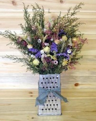 Cheese Grater Transformed Into a Flower Vase 
