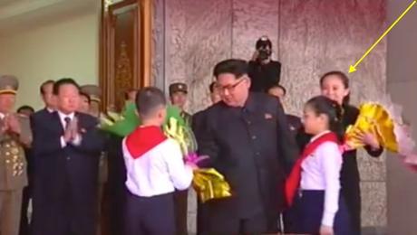 Kim Jong Un receives floral bouquets from members of the Korean Children's Union on May 10, 2016 prior to the start of a rally and parade celebrating the 7th Party Congress.  The floral bouquets are collected by his younger sister Kim Yo Jong, deputy director of the WPK Propaganda and Agitation Department (Photo: Korean Central TV).