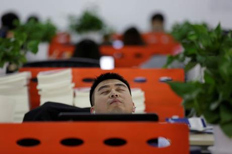 Even the cofounders find time to sleep. Here, Goopal cofounder Cui Meng naps in his seat after lunch.