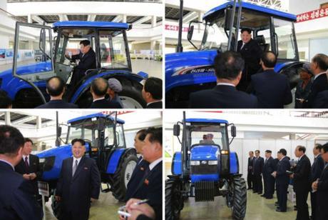 Kim Jong Un looks at and inspects a tractor developed by Ku'mso'ng Tractor Plant for the 7th Party Congress (Photo: Rodong Sinmun).