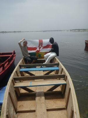 Visting A Pink Lake! : My Trip to Lac Rose in Senegal Northern Ireland and Senegal flags on Lac Rose