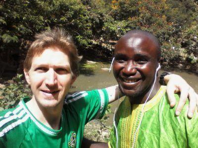 Stroking Crocodiles at Kachikally Pool, Bakau, The Gambia Zachariah and I - my driver