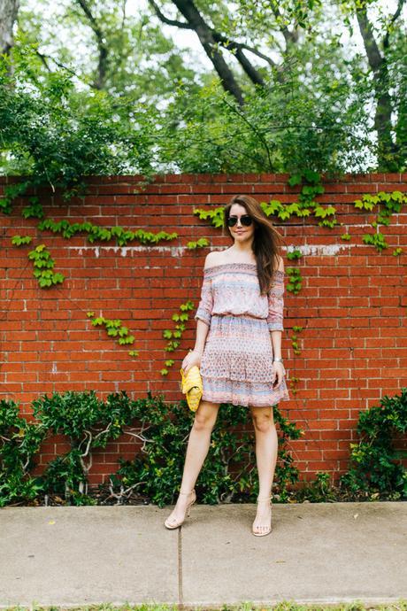 Dallas Blogger Amy Havins wears a printed off the shoulder shoshanna dress.